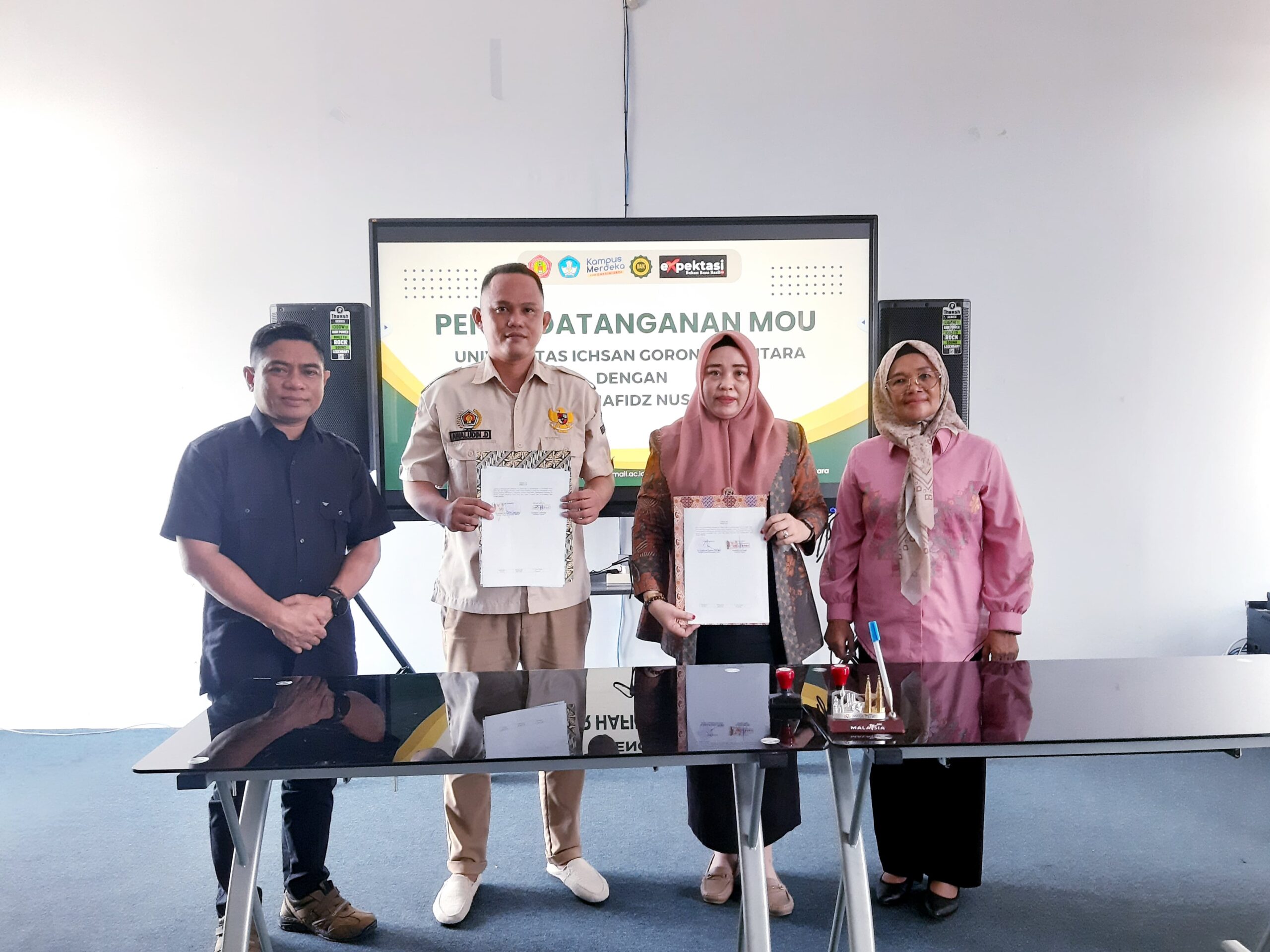 Foto : Rektor Unisan Gorut Dr. Fatma M. Ngabito, Kadis PPPA Gorut dan pihak PT. Syber Hafidz Nusantara