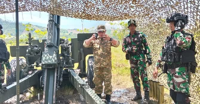 Bupati Kabupaten Bolaang Mongondow Utara (Boltara), Dr. Sirajudin Lasena, SE., M.Ec.Dev menghadiri kegiatan menembak kehormatan senjata berat Yonarmed 19/Bogani yang dilaksanakan di Komando Latihan Yonarmed 19/Bogani, Desa Sangkub,