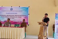Camat Tabukan Utara Marwan Nikiulu sedang Menyampaikan Sambutan dalam Pembukaan Sosialisasi