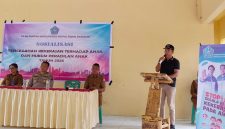 Camat Tabukan Utara Marwan Nikiulu sedang Menyampaikan Sambutan dalam Pembukaan Sosialisasi