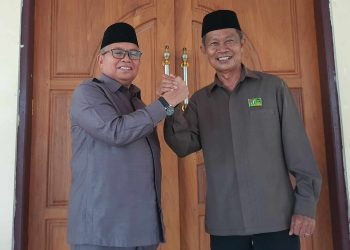 Foto istimewa Ketua DPC PPP Bolmut Mohamad Sidik Binol bersama Ketua DPC PDIP Bolmut Amin Lasena