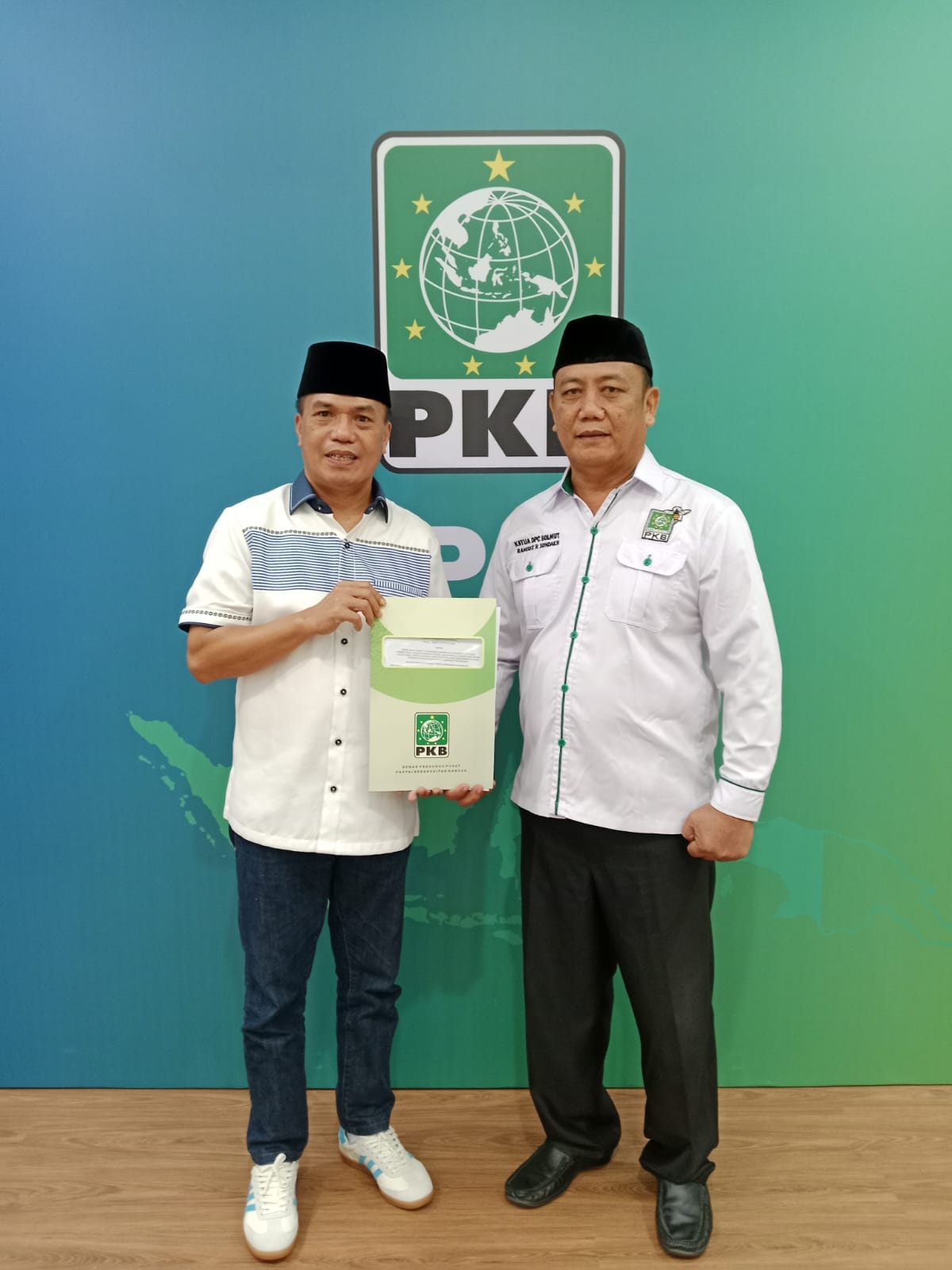 Foto Calon Bupati Suriansyah Korompot dan Calon Wakil Bupati Ramses Rizal Sondakh