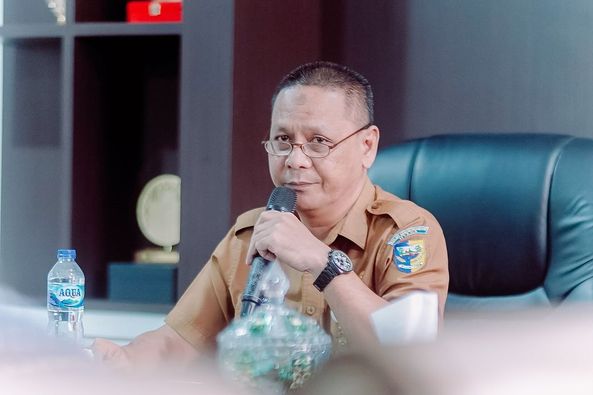 Foto: Asisten Bidang Pemerintahan dan Kesra, Rachmat R. Pontoh