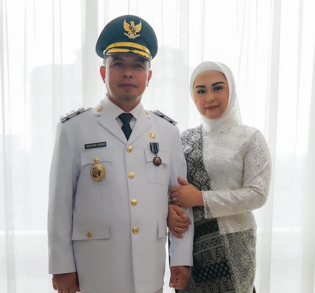 Foto Bupati Bolmut bersama Ibu Ketua TP PKK
