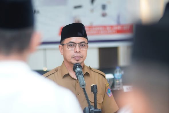 Bupati Bolmut Dr. Sirajudin Lasena