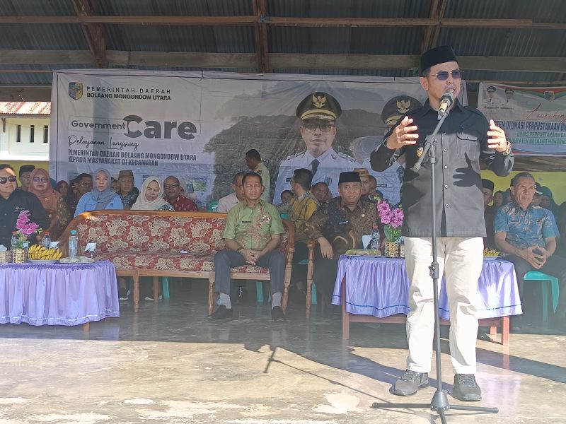 Bupati Boltara Dr. Sirajudin Lasena saat memberikan sambutan di giat Government Care Kecamatan Pinogaluman