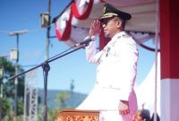Bupati Boltara Dr. Sirajudin Lasena bertindak sebagai Irup pengibaran bendera Merah Putih dalam rangka memperingati Hari Ulang Tahun (HUT) ke-80 Kemerdekaan Republik Indonesia