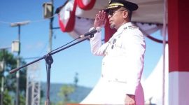 Bupati Boltara Dr. Sirajudin Lasena bertindak sebagai Irup pengibaran bendera Merah Putih dalam rangka memperingati Hari Ulang Tahun (HUT) ke-80 Kemerdekaan Republik Indonesia