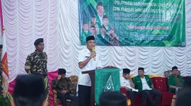 Wakil Bupati Boltara Moh. Aditya Pontoh saat membuka kegiatan PKL dan Susbalan GP Ansor Gedung Olahraga Desa Talaga Tomoagu