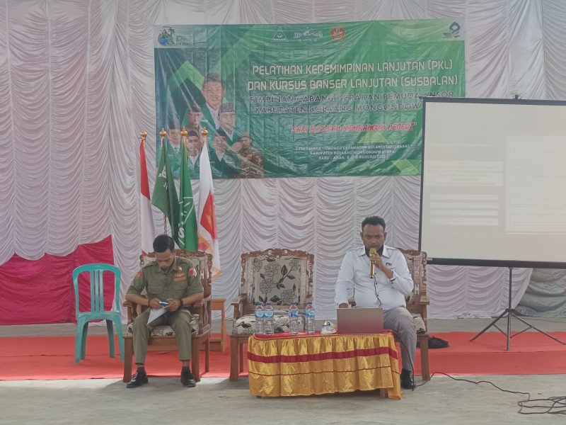 Kasat Intel Polres Boltara IPTU Marthinus Fatubun menjadi narasumber paha kegiatan PKL dan Susbalan GP Ansor dan didampingi oleh moderator Kasat Korcab Banser Faiz Tunggil