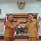 Wakil Gubernur Sulawesi Utara (Sulut), Dr. J. Victor Mailangkay, sekaligus Ketua PD GM FKPPI Sulut bersama Dr. Moh. Hidayat Panigoro sebagai Ketua Caretaker FKPPI Boltara