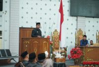 Bupati Boltara, Dr. Sirajudin Lasena saat memberikan sambutan pada rapat paripurna DPRD dalam rangka penandatanganan KUA-PPAS APBD 2026