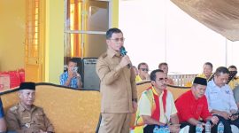 Bupati Boltara, Dr. Sirajudin Lasena saat memberikan sambutan pada perayaan HUT Partai Golkar ke-61 tingkat kabupaten Boltara. 
