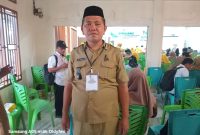 Sangadi (Kepala Desa) Huntuk, Oldy F. Kumolontang saat mengikuti Sosialisasi Data Tunggal Sosial dan Ekonomi Nasional (DTSEN) yang digelar di RM Coconut Beach, kawasan Pantai Batu Pinagut