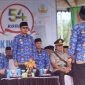 Bupati Boltara Dr. Sirajudin Lasena menerima laporan dimulainya proses upacara memperingati HUT Korpri ke-54, yang dipusatkan di lapangan kembar boroko. 