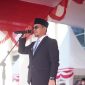 Bupati Boltara, Dr. Sirajudin Lasena saat menjadi Irup pada Peringatan Hari Ibu (HI) ke-97 yang dirangkaikan dengan Hari Bela Negara (HBN) ke-77 tingkat Kabupaten Boltara. Upacara berlangsung khidmat di halaman Kantor Bupati Boltara