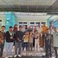 Kepsek Min 2 Kepulauan Sangihe Ismail Kantiandago serta guru-guru melakukan foto bersama dengan Kakan Kemenang Drs. KH. Kusnadi