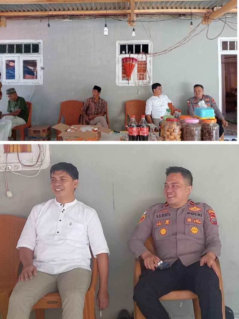 Ipda Harmen R. Kontu bersama dengan Kapitalaung (Kepala Desa) Kampung Ngalipaeng II Wahidin Salapali
