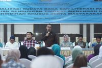 Bupati Boltara, Dr. Sirajudin Lasena membuka sekaligus memberikan sambutan Pemerintah pada kegiatan sosialisasi budaya baca dan literasi