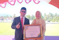 Bupati Boltara, Dr. Sirajudin Lasena bersama Kepala Dinas PPKBPPPA Boltara, Yani Lasama