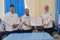 Sertijab Kominfo Boltara, Mirwan Datukramat serahkan kepemimpinan pada Sriwahyuni Pontoh dan disaksikan langsung oleh Asisten III Pemkab Boltara, Abdul Nazarudin Maloho