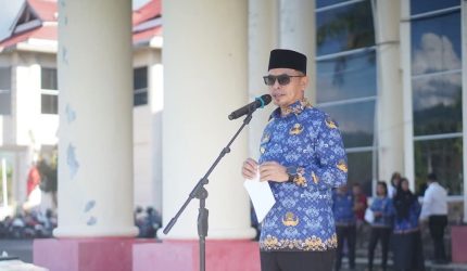 Bupati Bolaang Mongondow Utara (Boltara), Dr. Sirajudin Lasena, SE., M.Ec.Dev., memimpin Apel Korps Pegawai Republik Indonesia (KORPRI) di Lingkungan Pemerintah Daerah Kabupaten Boltara Tahun 2026, yang dilaksanakan di halaman Kantor Bupati Boltara