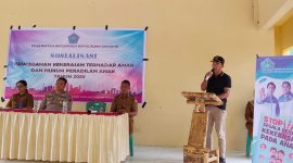 Camat Tabukan Utara Marwan Nikiulu sedang Menyampaikan Sambutan dalam Pembukaan Sosialisasi