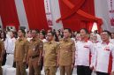 Bupati Boltara Sirajudin Lasena bersama kepala daerah lainnya di pengukuhan Srikandi Jaga Desa