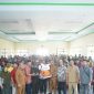 Bupati Boltara Sirajudin Lasena beserta jajaran menyerahkan bantuan Benih jagung bersumber dari APBN kepada kelompok tani