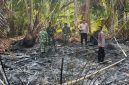 Kapolsek Tabukan Utara Iptu David Kojongian bersama anggota Polsek, dan Danramil Tabukan Utara dan Anggota Koramil Tabukan Utara