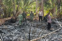 Kapolsek Tabukan Utara Iptu David Kojongian bersama anggota Polsek, dan Danramil Tabukan Utara dan Anggota Koramil Tabukan Utara