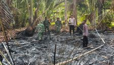 Kapolsek Tabukan Utara Iptu David Kojongian bersama anggota Polsek, dan Danramil Tabukan Utara dan Anggota Koramil Tabukan Utara