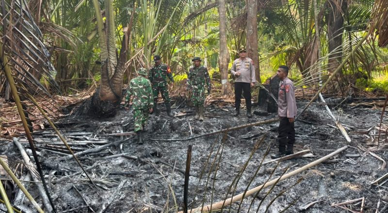 Kapolsek Tabukan Utara Iptu David Kojongian bersama anggota Polsek, dan Danramil Tabukan Utara dan Anggota Koramil Tabukan Utara