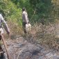 Usaha Pemadaman Api yang di lakukan oleh personil anggota Polsek Tabukan Tengah