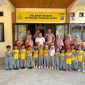Kapolsek Pinogaluman Iptu Musril Melanu menyambut Siswa TK Terpasldu Al-Multazam desa Tombolango Pantai