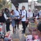 Plt Bupati Boltara Mohammad Aditya Pontoh menyerahkan sejumlah bantuan kepada korban kebakaran rumah dan didampingi oleh Pimpinan OPD terkait