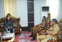 Plt. Bupati Boltara Mohammad Aditya Pontoh bersama Kepala BPJS Boltara Maria Meidy Lumi