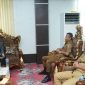 Plt. Bupati Boltara Mohammad Aditya Pontoh bersama Kepala BPJS Boltara Maria Meidy Lumi